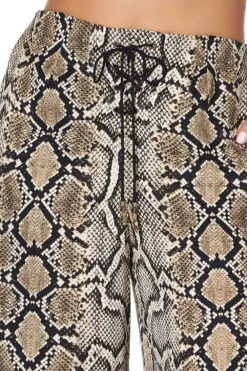 LACE UP FRONT FLARED PANT KAKADU BOO -Vivid Couture lace up front flared pant kakadu boo 8 b3d217b6 9ee5 41f1 a27e 13e02b983ece