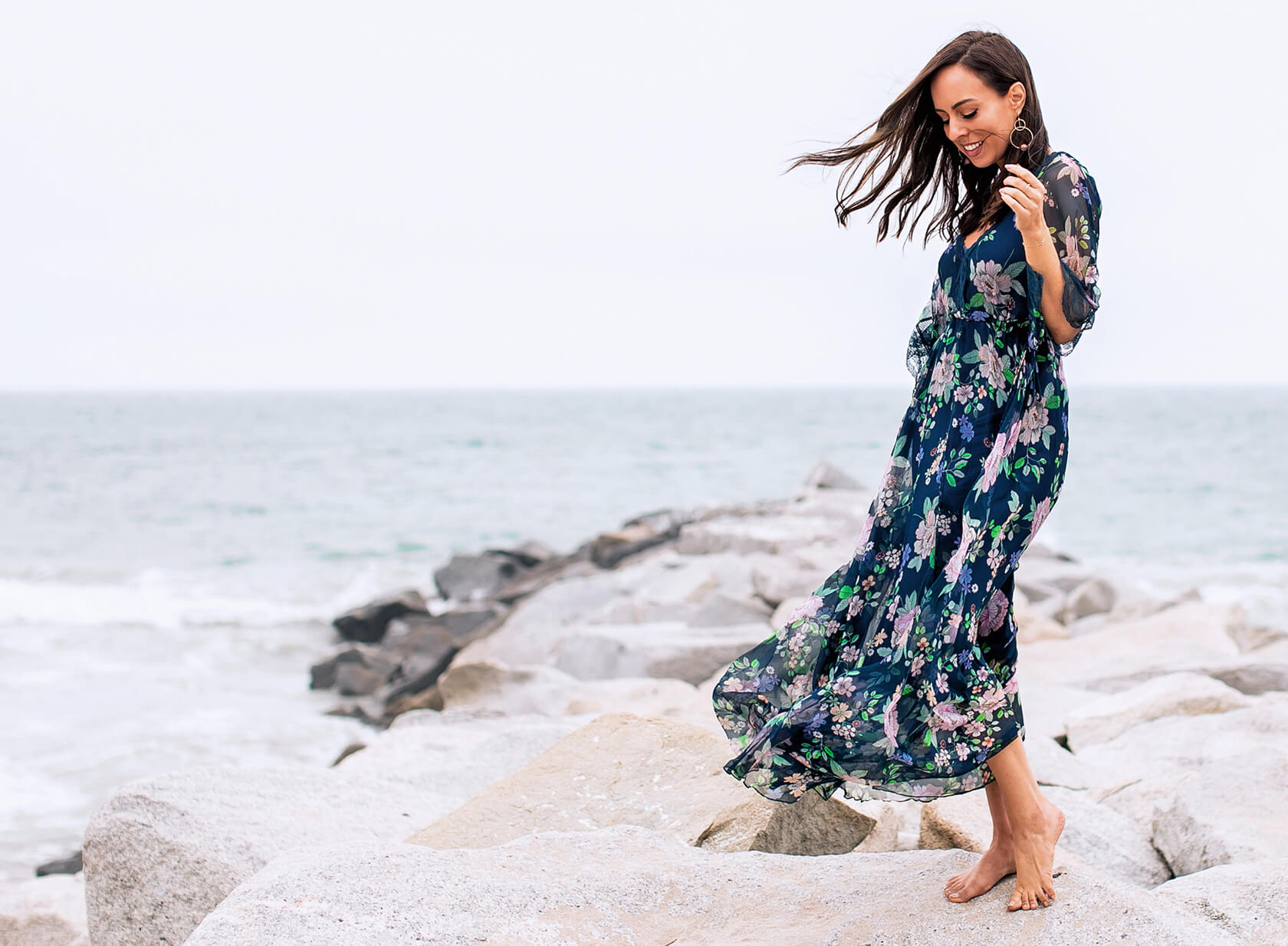 Vivid Couture -Vivid Couture Sydne Style shows what to wear on a beach vacation in floral maxi dress